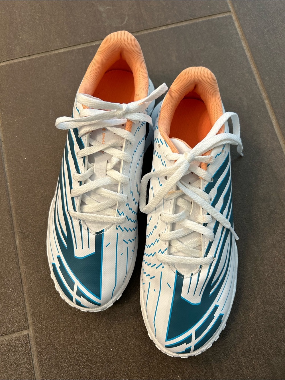 Under Armour White Teal and Orange Youth Athletic Sneakers